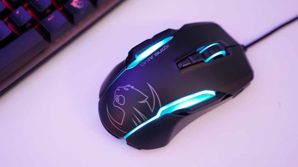 Roccat Kone Aimo gaming mouse with illuminated logo and scroll wheel.