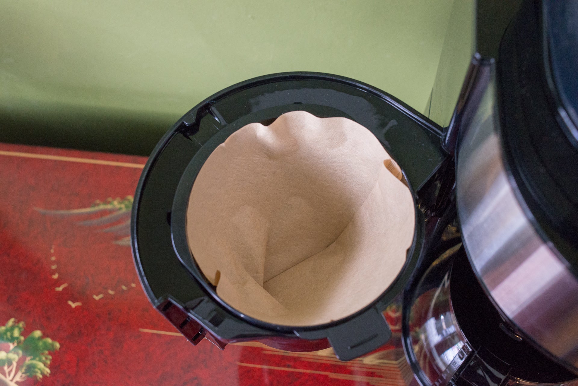 Close-up of an empty Melitta coffee filter basket.