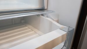 Close-up of Bertazzoni refrigerator interior shelving detail.