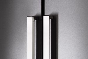 Close-up of Bertazzoni REF90X fridge stainless steel doors.