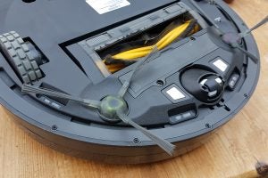 Ecovacs Deebot R95 robotic vacuum with smartphone app.Ecovacs Deebot R95 robotic vacuum cleaner underside view.