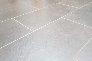 Tiled floor before using Ecovacs Deebot R95 vacuum.