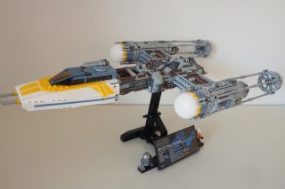 LEGO Star Wars UCS Y-Wing model on display stand with information plaque.