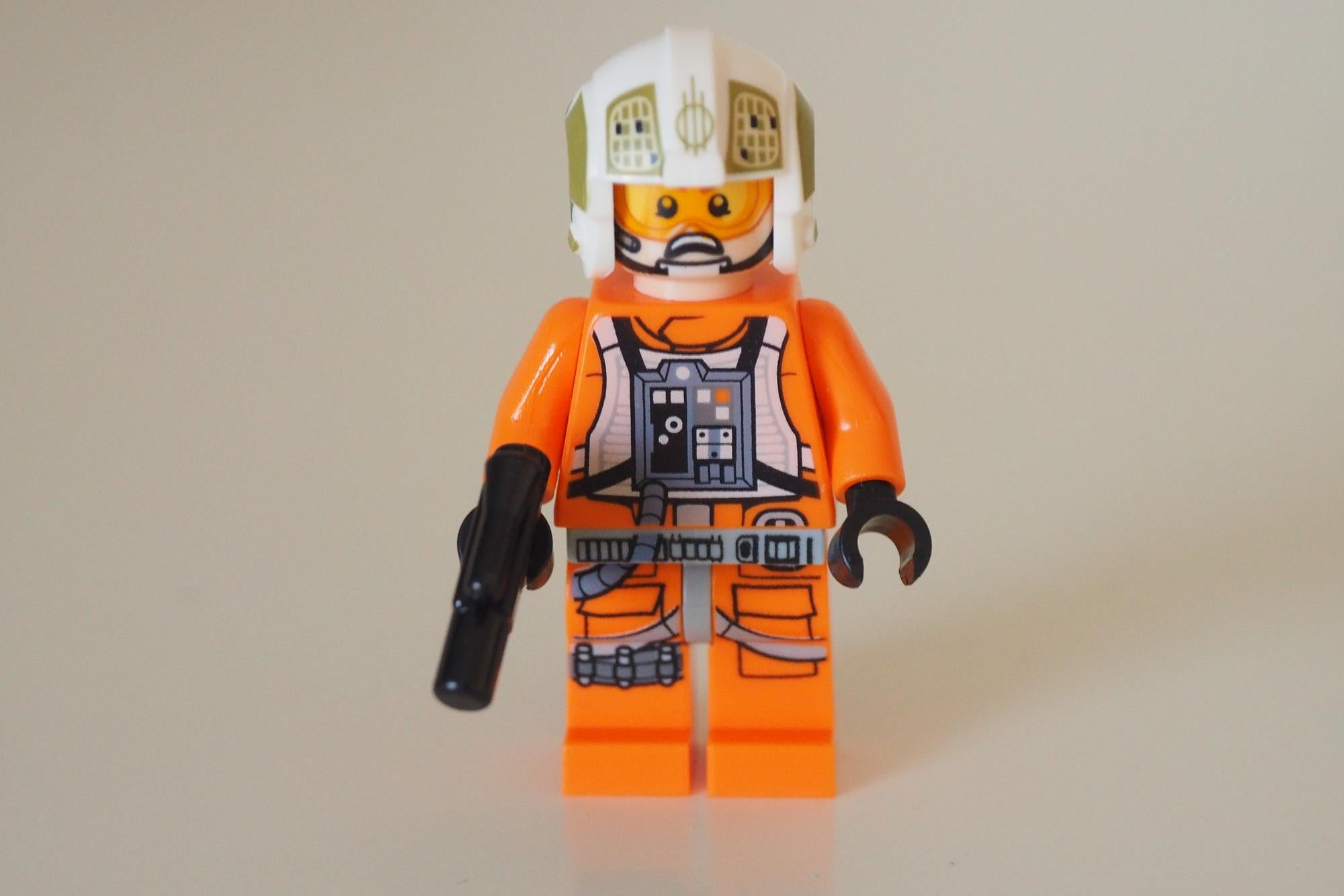 LEGO Star Wars minifigure with helmet and blaster.