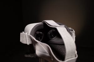 Close-up of Oculus Go VR headset on a dark background.