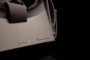 Close-up of Oculus Go headset showing power and volume buttons.