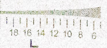 Grainy photo of a ruler showing measurement in inches.