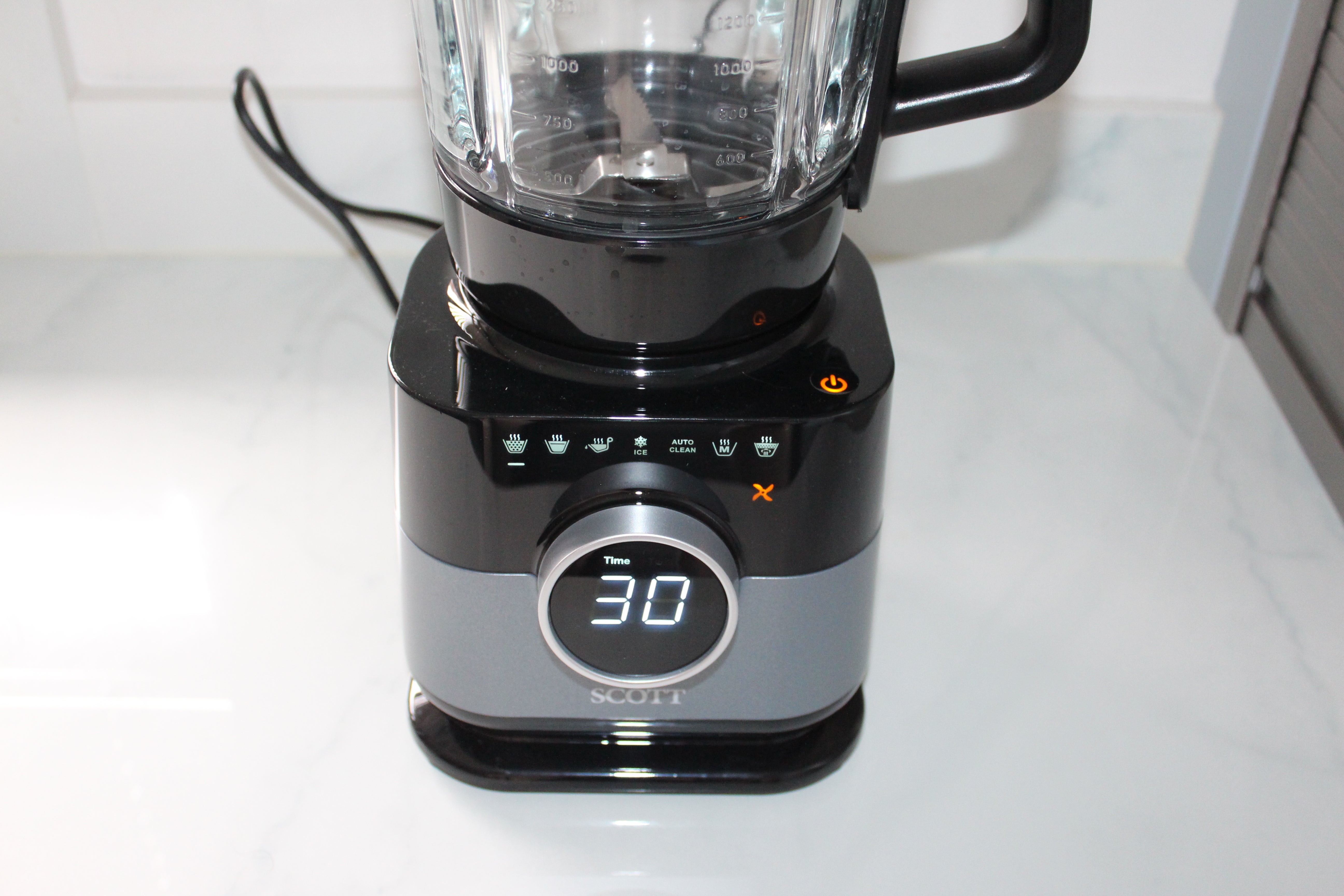Scott Simplissimo Chef blender on kitchen counter with digital timer display.