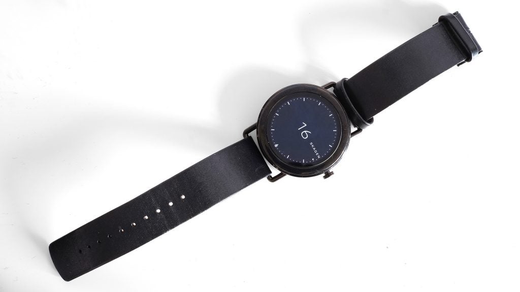 Skagen Falster smartwatch with black leather strap on white background.