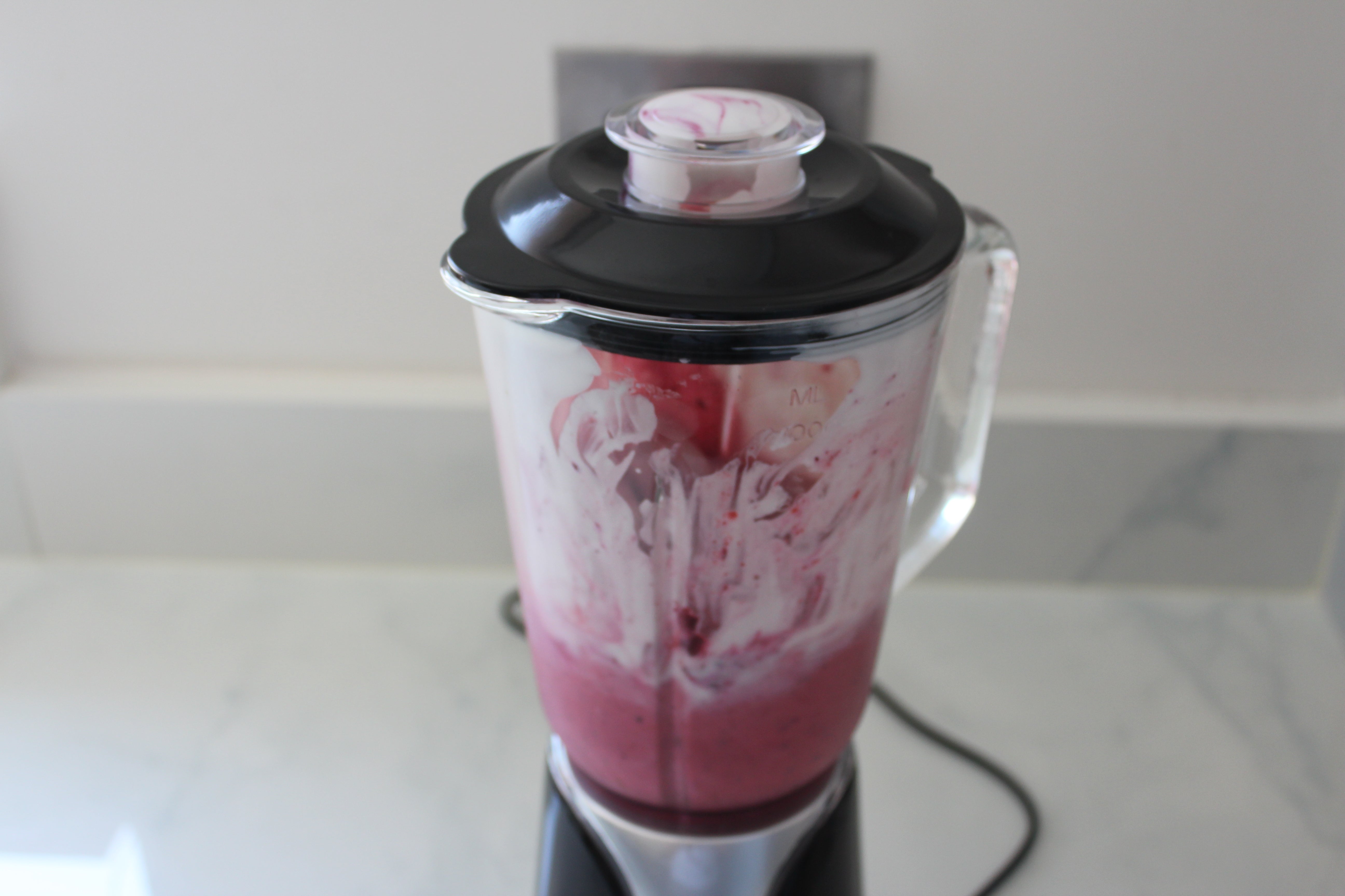 Weight Watchers blender with freshly made berry smoothie.