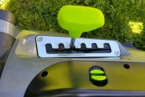 Close-up of Gtech Falcon lawnmower height adjustment lever.