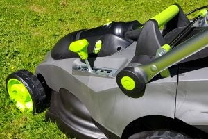 Close-up of Gtech Falcon Cordless Lawnmower handle and controls
