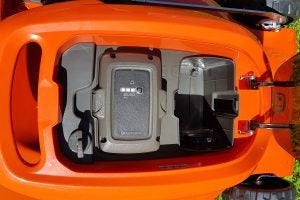 Battery compartment of Husqvarna LC 347VLi lawn mower.