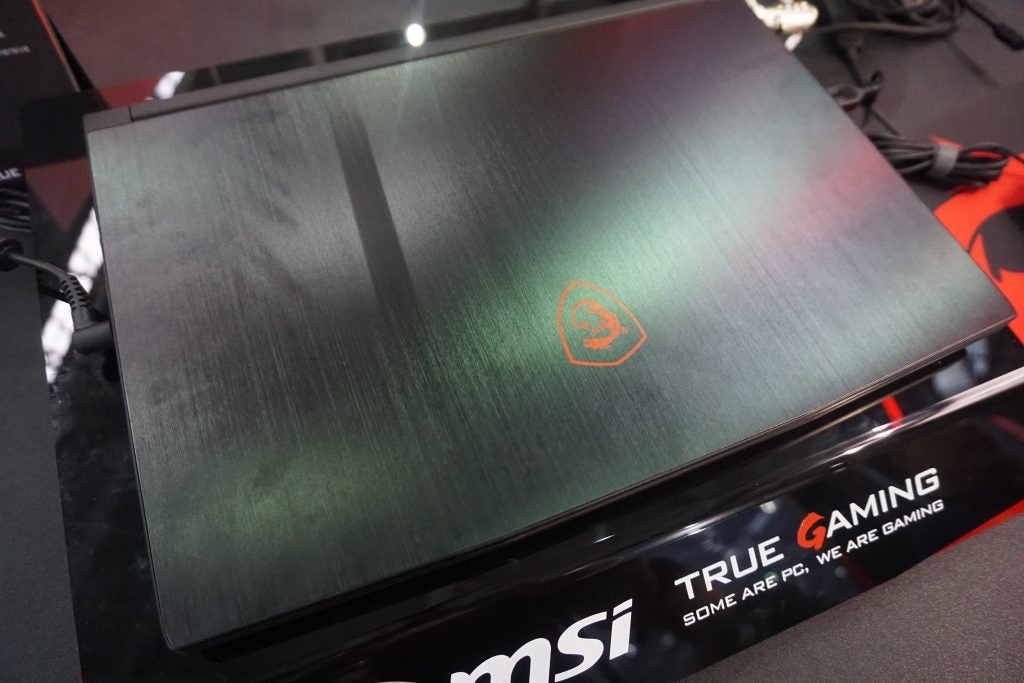 MSI GF63 gaming laptop on display with logo visible.