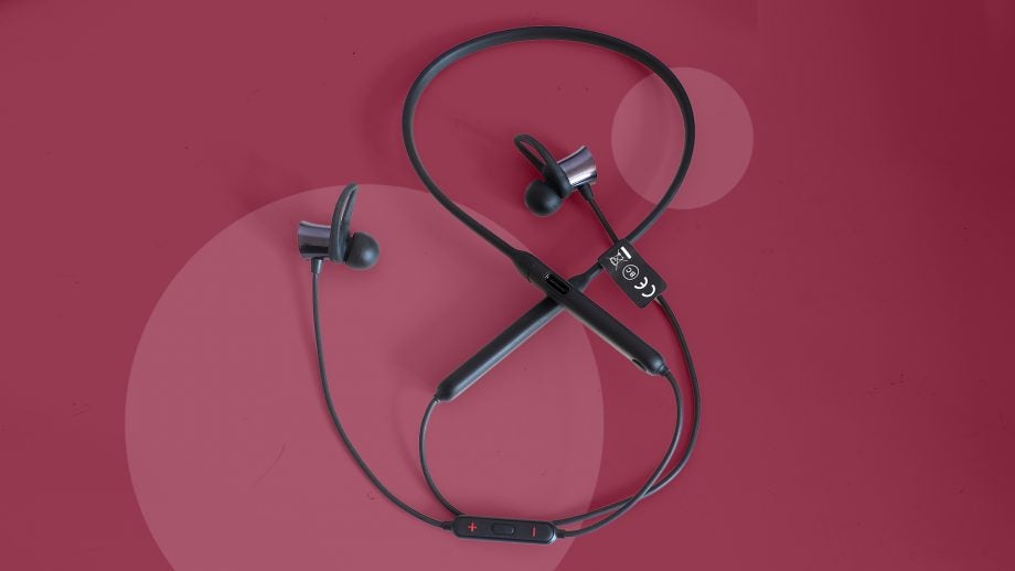 OnePlus Bullets Wireless earphones on a red background.