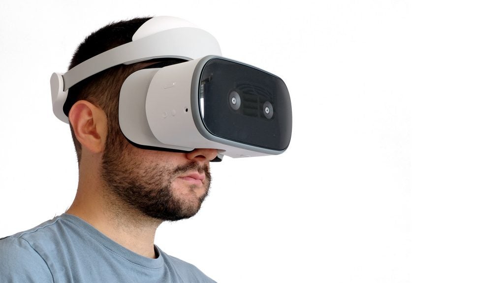 Man wearing Lenovo Mirage Solo VR headset.