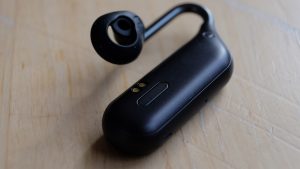 Inside view of a black Sony Xperia Ear Duo's earbud kept on table