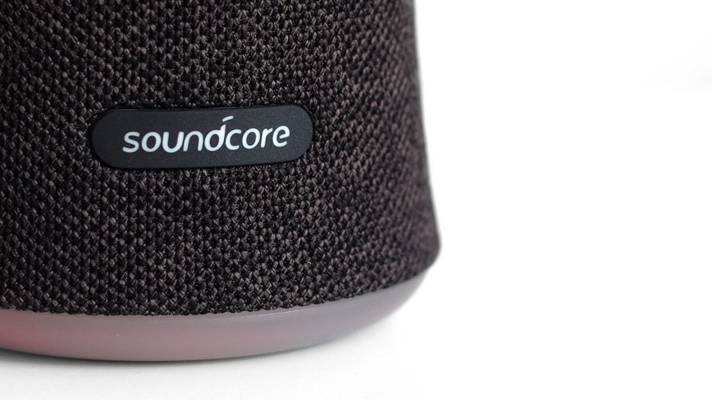 Anker Soundcore FlareClose up view of Soundcore logo on a black Soundcore Flare standing on white background