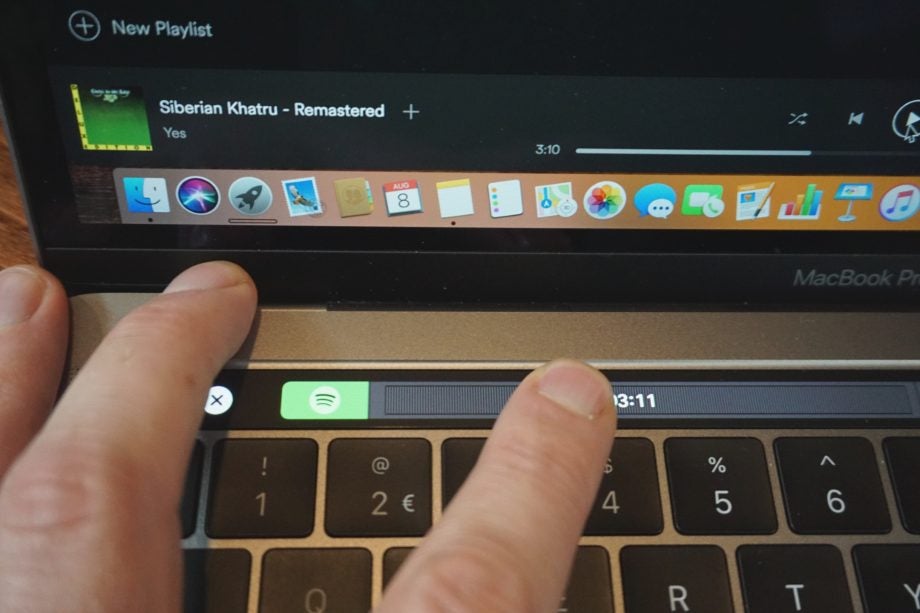Using the Touch Bar of the 2018 MacBook Pro to skip to Rick Wakeman's harpsichord solo in 'Siberian Khatru' by Yes on Spotify for Mac.