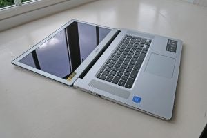 The Acer Chromebook 15 (CB515-1HT), with the screen pushed all the way back so that it's flush with the desk it's sat on