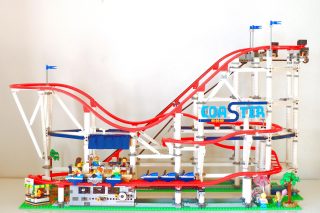 A Lego set of roller coaster built and kept on floor