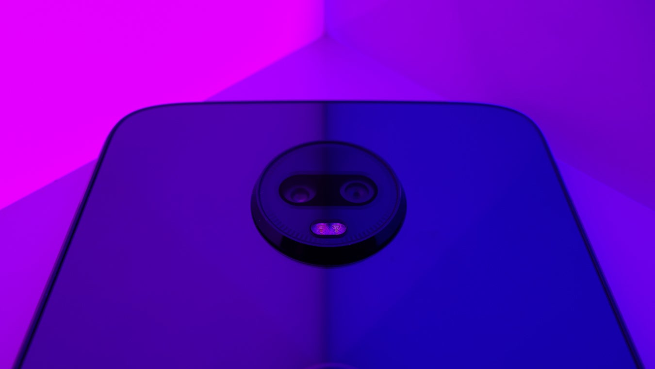 Moto Z3 Play with pink blue LED panels camera closeup