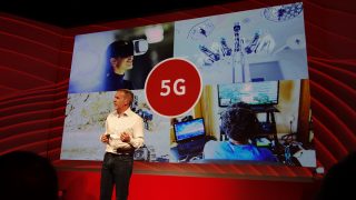 Vodafone UK's Scott Petty on stage talking 5G