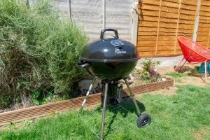 Gifts under £50 for dads: George Foreman Kettle Charcoal BBQFront view of a black Corsair Dark Core RGB Pro kept on a table