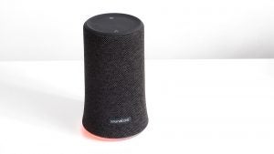 Gifts under £100 for dads: Anker Soundcore Flare View from top of a black Corsair Dark Core RGB Pro kept on a tableSide view of a black Corsair Dark Core RGB Pro kept on a table with side cover removed