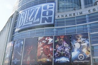 A big building named BlizzCon with posters of games hanging below