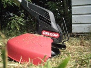 Oregon 36V Cordless ST275 Trimmer head in use