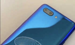 Close up view of pop-up camera of Honor 9X displaying camera, top half view