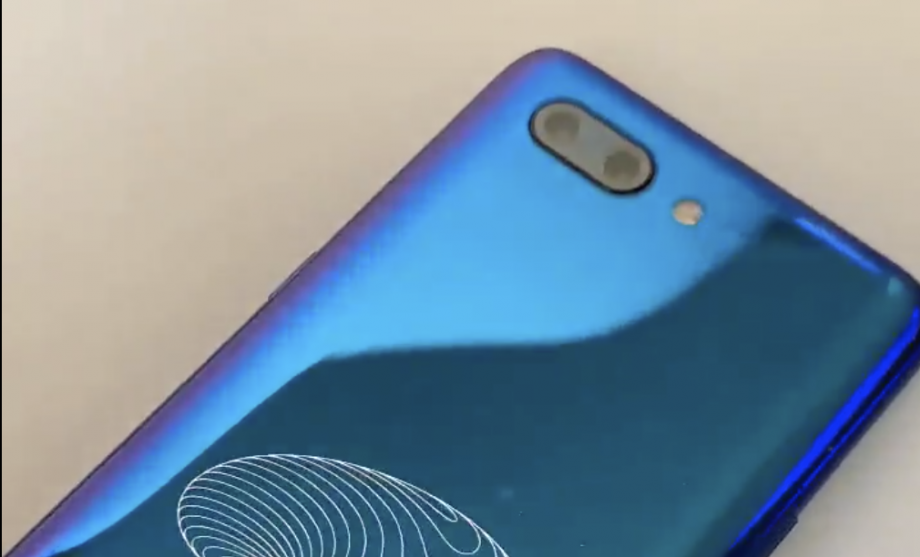 Close up view of pop-up camera of Honor 9X displaying camera, top half view