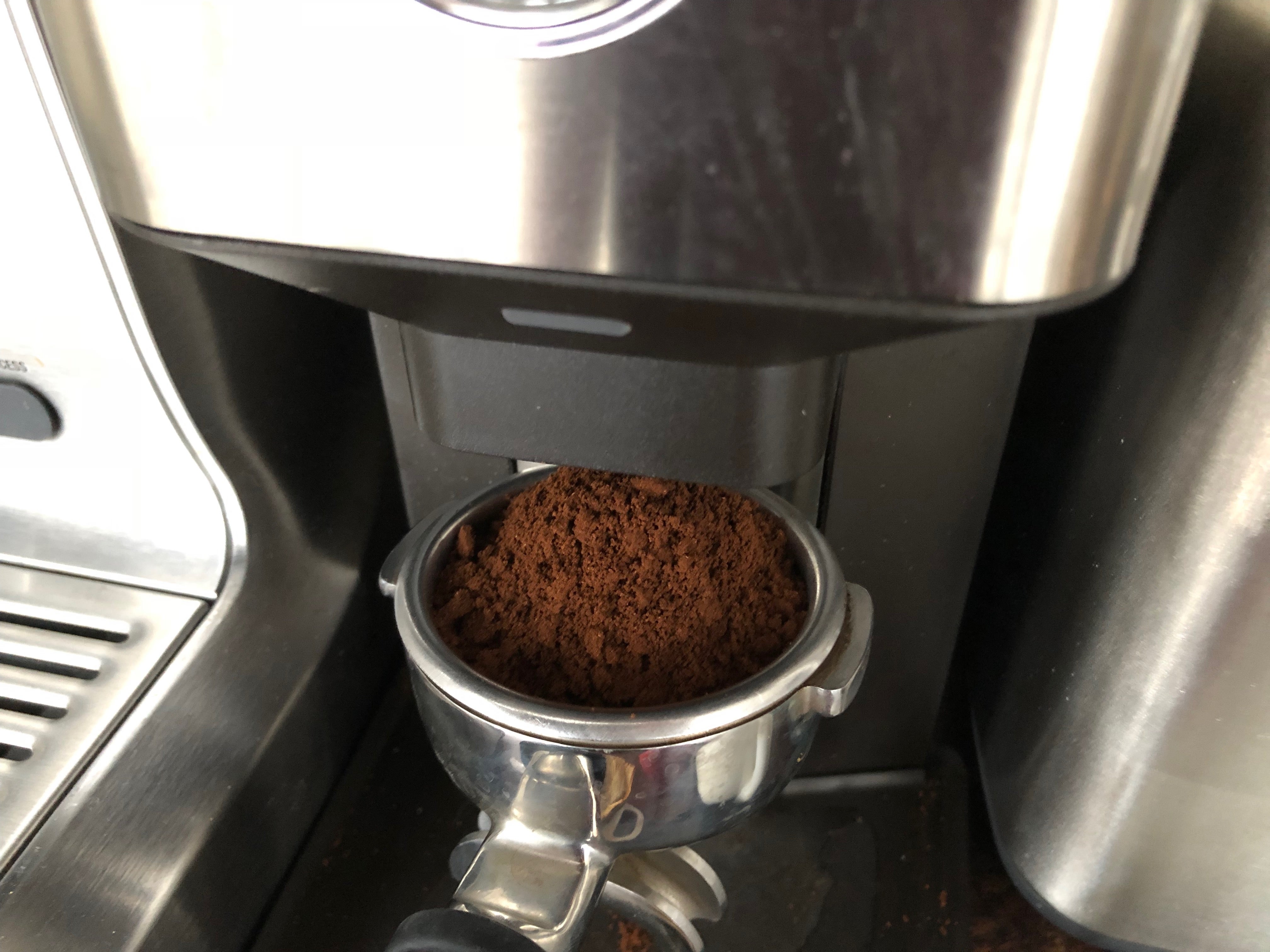 Griding coffee to make espresso