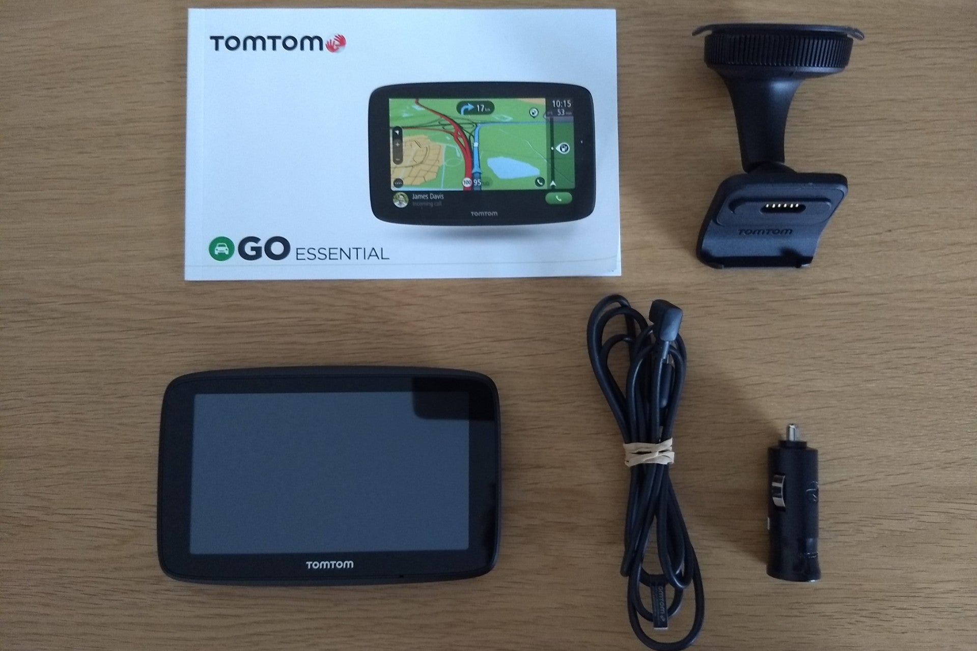 TomTom Go Essential box contents: SatNav, USB cable, 12V adaptor, mount and getting started guide 