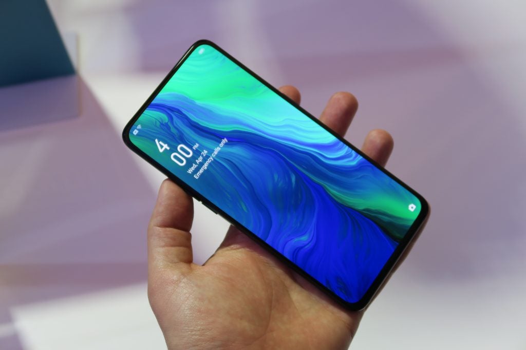 Oppo Reno 10x Zoom hands on handheld front angled