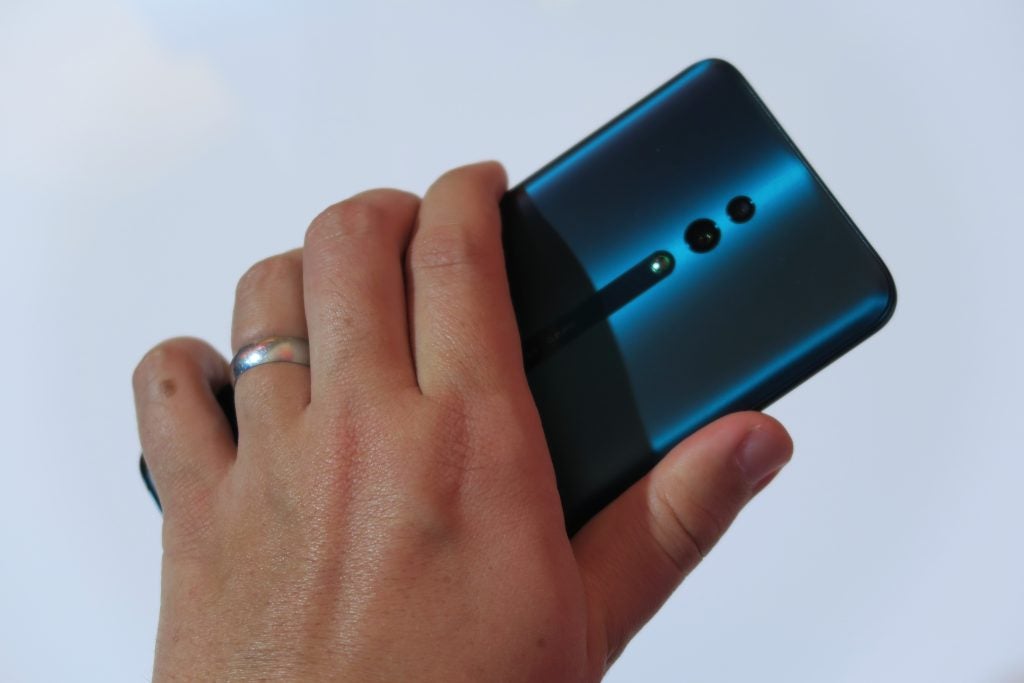 Oppo Reno hands on handheld back angled