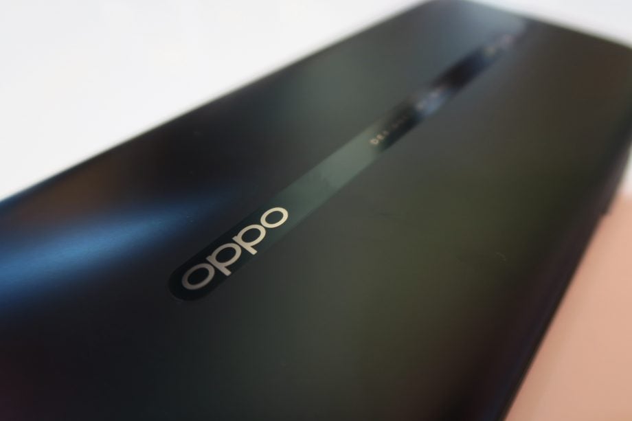Oppo Reno hands on logo perspective angled