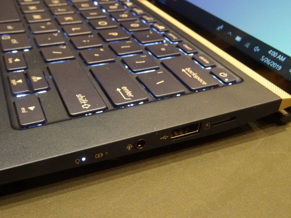 Close up view of ports section on right edge of a Asus Zenbook 2019 kept on a table