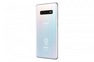 Back panel view of a Samsung Galaxy S10 Olympic game edition standing on a white background