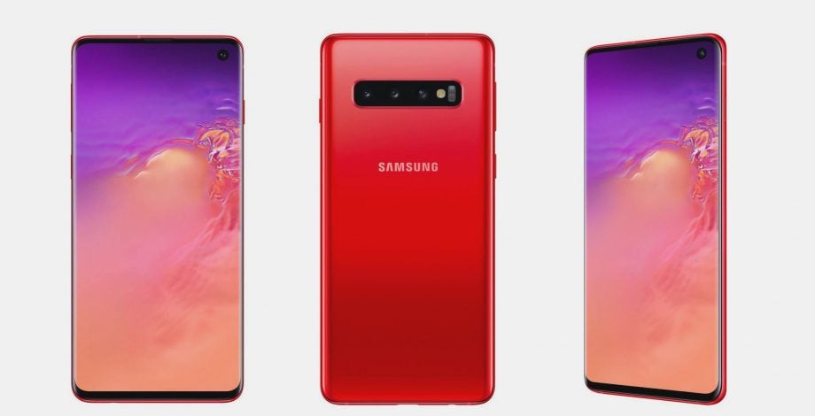 Three red Samsung Galaxy S10 standing on white background showing front and back panel