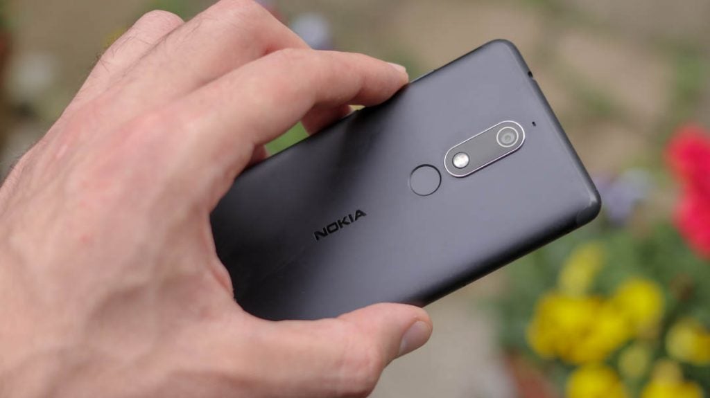 Nokia 5.1 back top half angled handheld