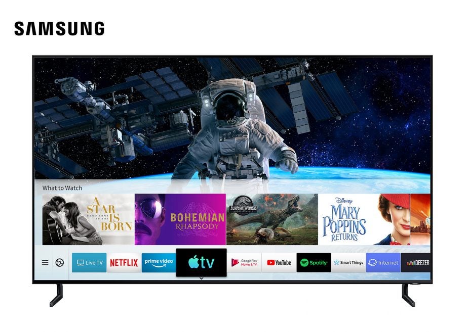 A black Samsung TV standing on a white background displaying Apple TV Airplay on homescreen