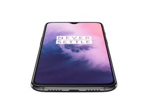 Bottom angled view of a black OnePlus 7 laid on a silver background displaying Never Settle wallpaperTop-right angled view of a black One Plus 7 laid on a silver background displaying Never Settle wallpaper