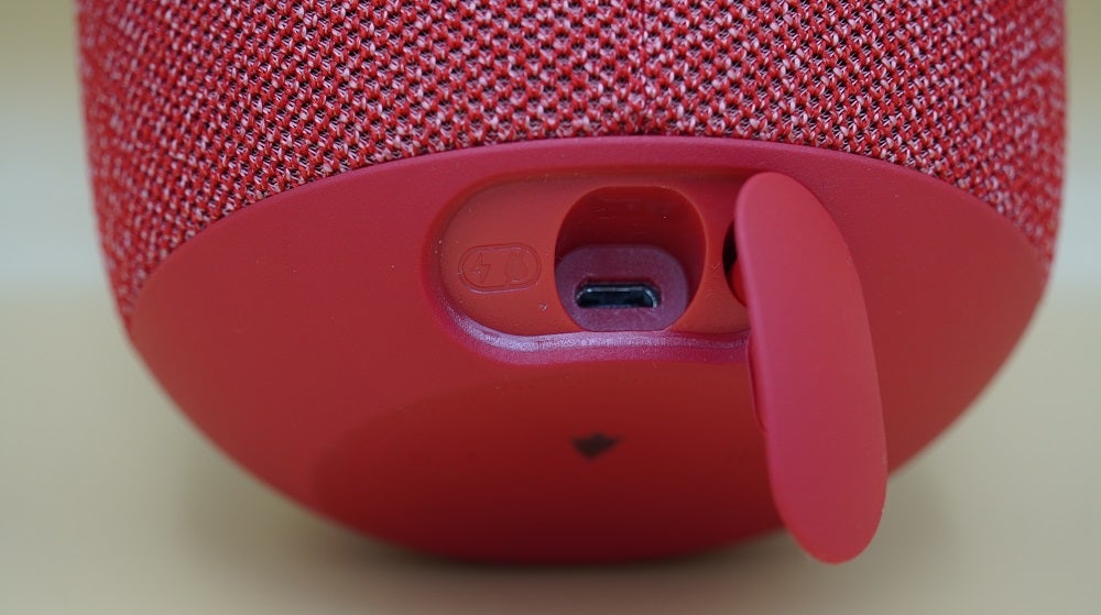 Close up image of a red UE Wonderboom speaker's ports section
