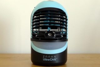 A blue-black Zaahn Ultra Chill Deluxe standing on a table