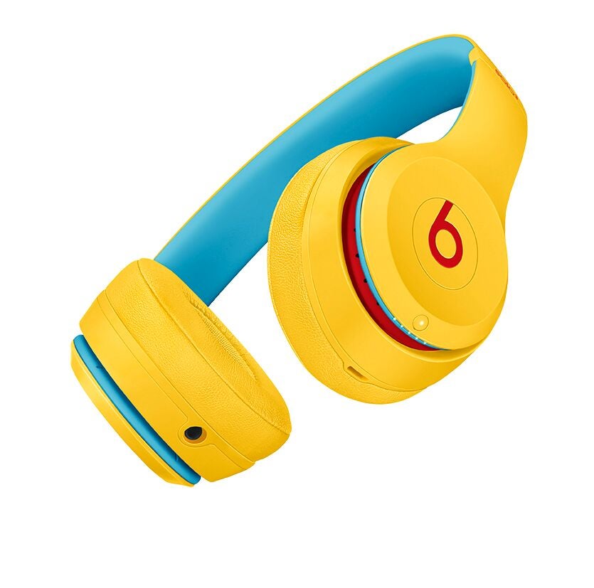 Beats Solo3 WirelessYellow-blue Beats Solo 2 headphones floating on a white background