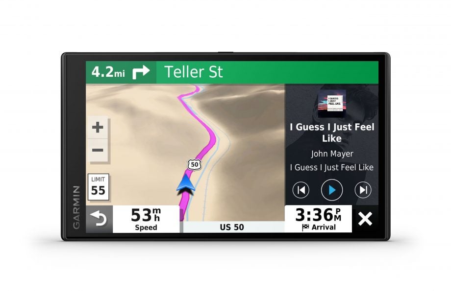 A black Garmin DriveSmart 65 standing on a white background displaying navigation on maps