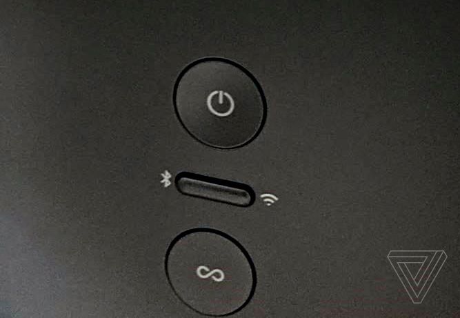 Close up image of a black ConceptD laptop's touchpad