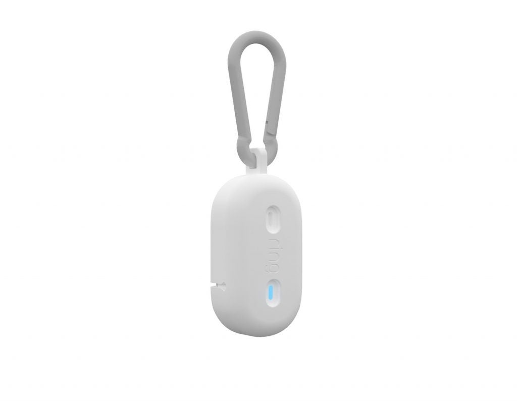 A white Ring key chain floating on a white background